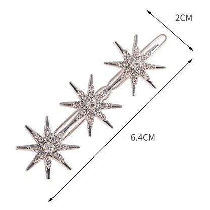 Metallic snow flakes hair slide