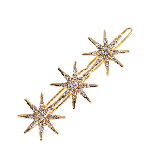 Metallic snow flakes hair slide