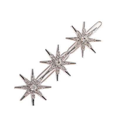 Metallic snow flakes hair slide