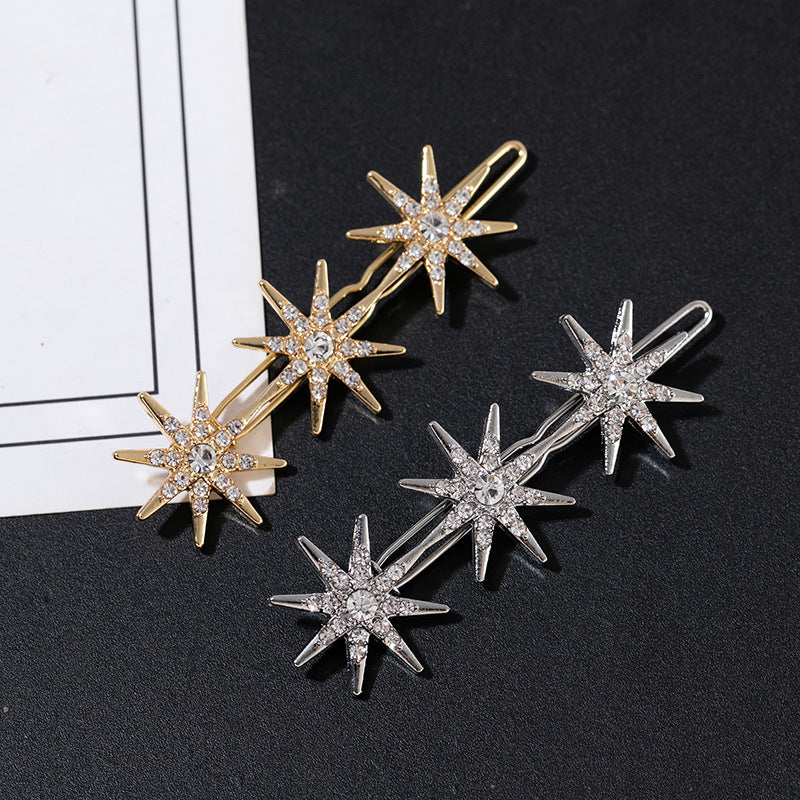 Metallic snow flakes hair slide