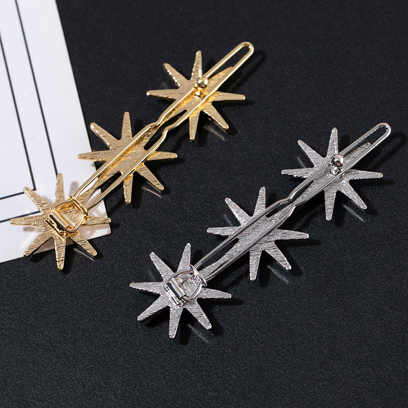 Metallic snow flakes hair slide