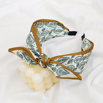 Paisley floral print headband with bow