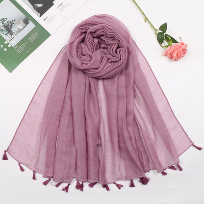 Plain long scarf with tassels