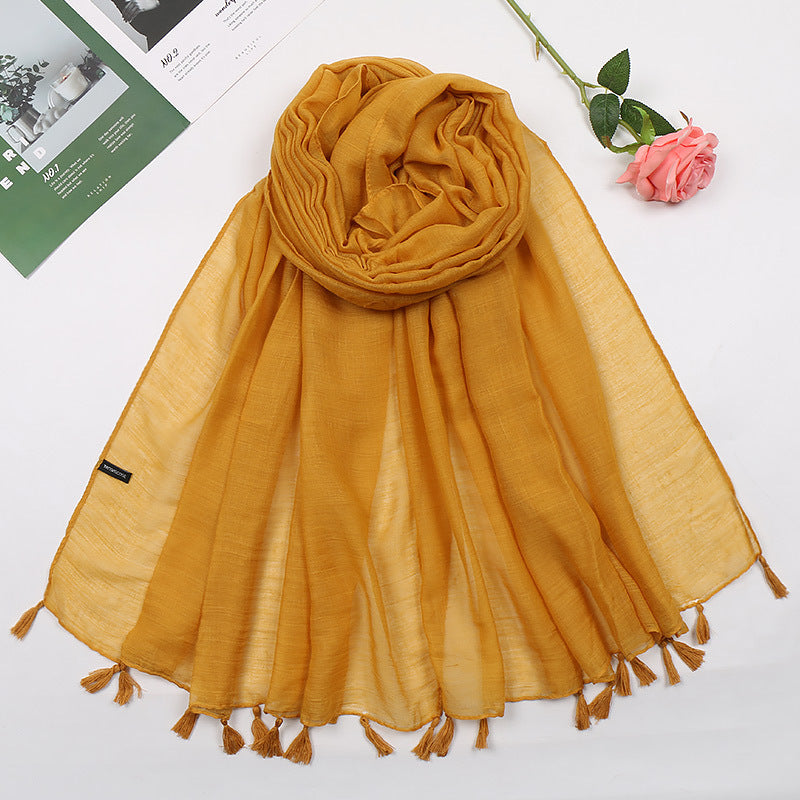 Plain long scarf with tassels