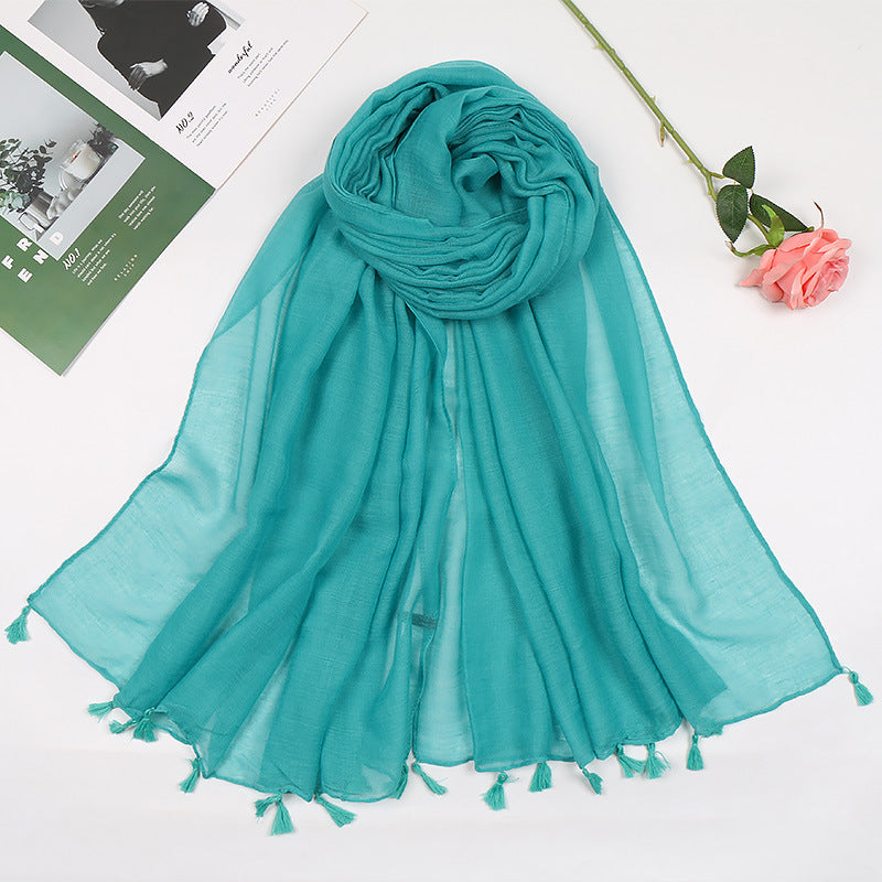 Plain long scarf with tassels