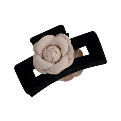 Black velvet hair claw with flowers