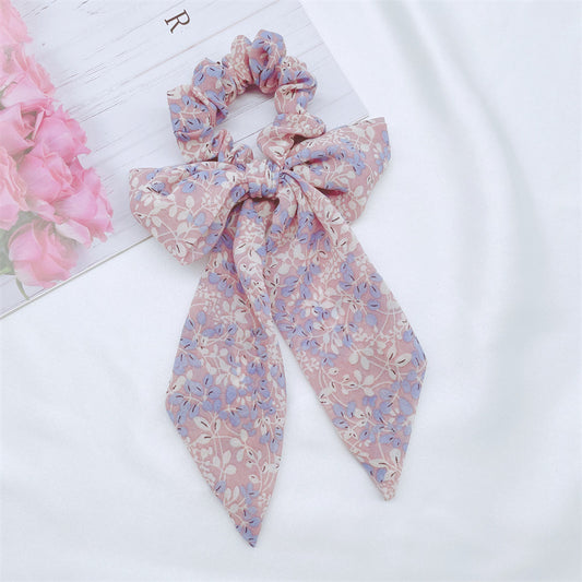 Floral scrunchies in blue and lilac