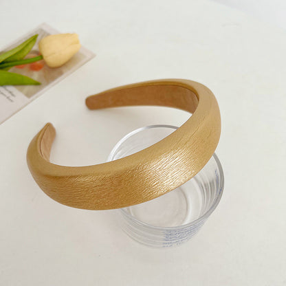 Textured glossy leather padded headband