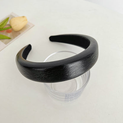 Textured glossy leather padded headband