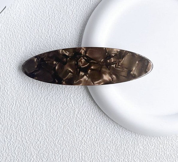 Stone patterned large flat oval resin hair barrette