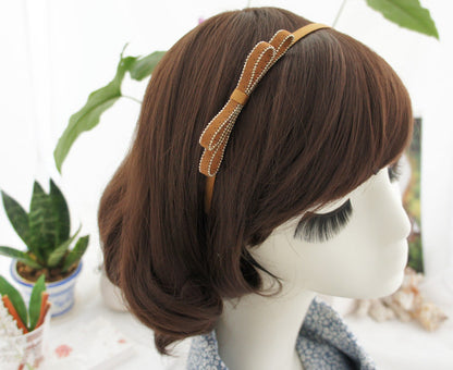 Suede slim headband with bow