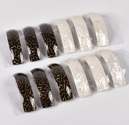 Patterned arch rectangle hair barrette