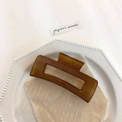 Rectangle-shaped large acrylic hair claw in coffee colour
