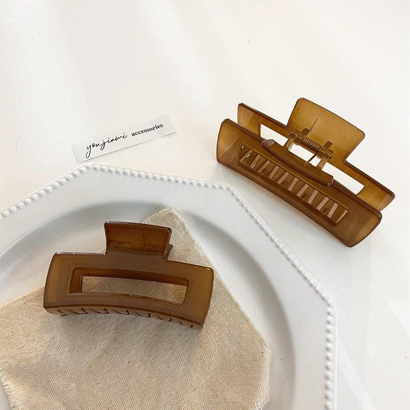 Rectangle-shaped large acrylic hair claw in coffee colour