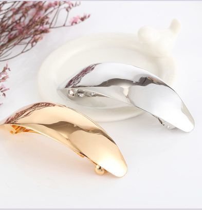 Oval shiny metal hair barrette