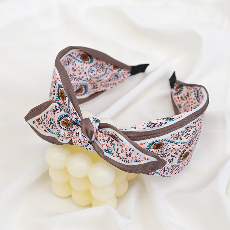 Paisley floral print headband with bow